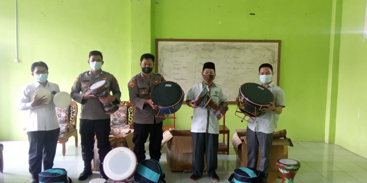 Kunjungi PW NU, IPDA Nyarna Serahkan Paket Hadroh