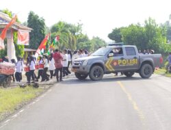 Polsek Ketahun Kawal Gerak Jalan SDN 37 dan SMPN 13