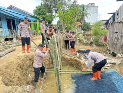 Brimob Sumut Gerak Cepat Perbaiki Tanggul Jebol di Tanjung Pura, Warga Apresiasi Tinggi