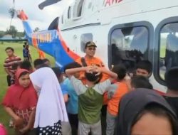 Tawa Anak-Anak Tamiang Jadi Sumber Semangat Bagi Kru Helikopter Polri