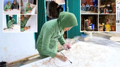 Seorang perempuan sedang membatik di atas kain dalam proses pembuatan batik khas Rejang Lebong.