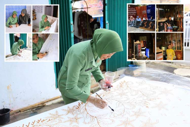 Seorang perempuan sedang membatik di atas kain dalam proses pembuatan batik khas Rejang Lebong.